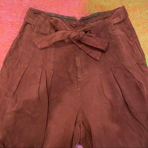 Wide leg pants with zipper, buttons and tie. Super comfy!
